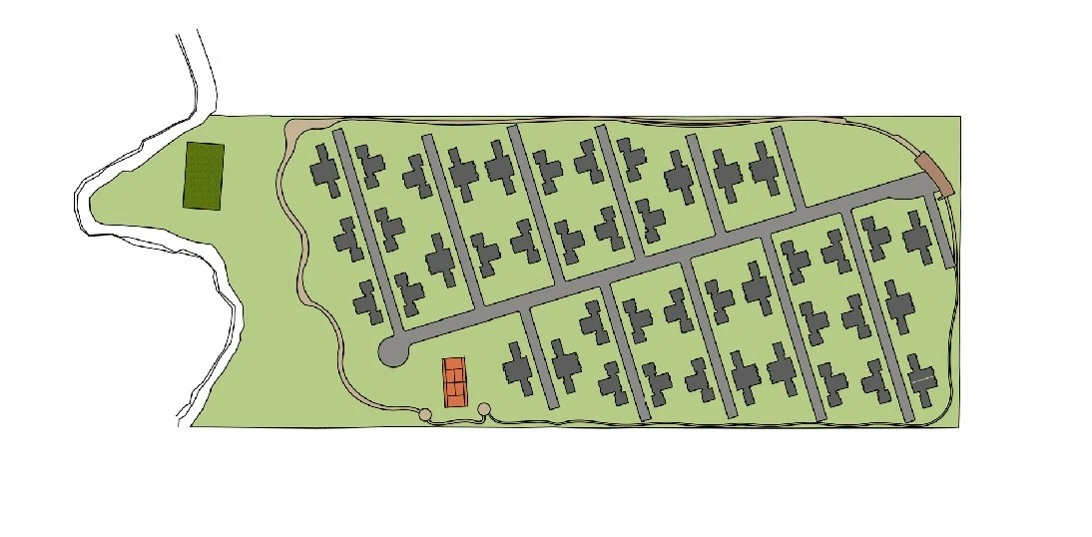 The siting of the houses: paired houses all turned toward the same solar face, with the football pitch and tennis court leaning on the park.